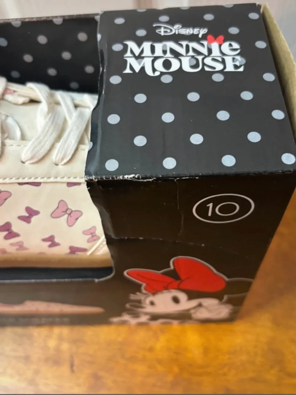 Woman’s Disney Cream Sneakers with Pink Bow Print